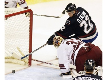 Mar. 29, 2004: Vancouver Canucks' forward Daniel Sedin (#22) put the puck into the net past Phoenix Coyotes' goalie Brian Boucher (#33) but after the referee had ruled the play dead during the third period.