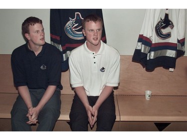 July 5 2000: The Vancouver Canucks introduced the Sedin twins to the local media. L-R. Daniel and Hendrik Sedin patiently answer reporter's questions.