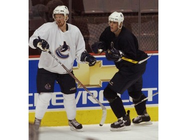 Sept.13, 05: The Vancouver Canucks play their first scrimmage game in front of fans at their Training Camp at GM Place in preparation for the 2005 NHL season. (l-r) Daniel Sedin and Bryan Allen.