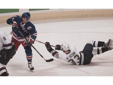 Nov. 17, 2000: Vancouver Canucks Henrik Sedin covers his check who is   New York Rangers Mark Messier in a game Canucks won 4-3 at GM Place.