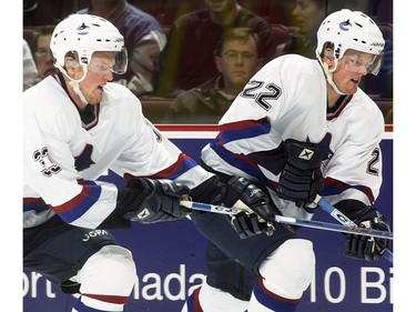 Dec. 11, 2002: Henrik Sedin (#33) and his twin brother Daniel Sedin (#22) during regular season NHL first period action against the Colorado Avalanche.
