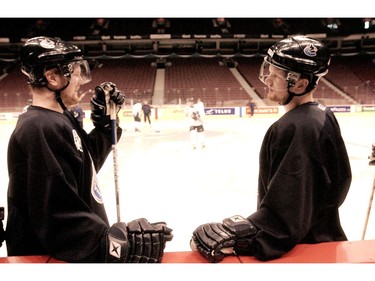 April 5, 2004: Daniel and Henrik Sedin (can't identify) during practice at GM Place.  The Canucks play their first playoff game of the year Wednesday against the Calgary Flames.
