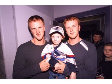 Oct. 8, 2002: Three-year-old cancer patient Christopher Fraser and the Sedin twins at the Cranbrook Recreational Complex.  The thrill of a lifetime for Christopher Fraser of Cranbrook with two of his favourite hockey players.