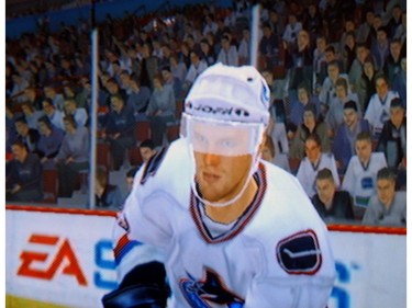 Copy of Electronic Arts NHL 2005 video game showing close-up of Daniel Sedin.