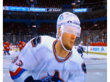 Copy of Electronic Arts NHL 2005 video game showing close-up of Henrik Sedin.