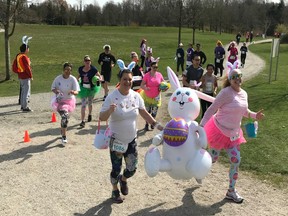 Shelley Hatfield of Aldergrove, right, brought her colourful running bunnies and lots of props to Jericho Beach on Saturday afternoon to boost the festive spirit of the third annual Big Easter Run, put on by the Vancouver-based Running Tours Inc.