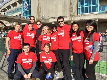 A few of the 80+ strong medical team -- first aid, paramedics, doctors -- ready to help if needed.  Vancouver Sun Run.  [PNG Merlin Archive]