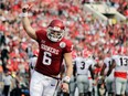 University of Oklahoma Sooners quarterback Baker Mayfield (above) celebrates after running back Rodney Anderson scored a touchdown against Georgia during the Rose Bowl game in Pasadena, Calif., on Jan. 1, 2018. Mayfield was picked first overall by the Cleveland Browns in the NFL Draft on April 26, 2018.