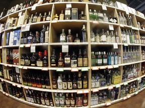 FILE - This June 16, 2016 file photo made with a fisheye lens shows bottles of alcohol during a tour of a state liquor store in Salt Lake City.