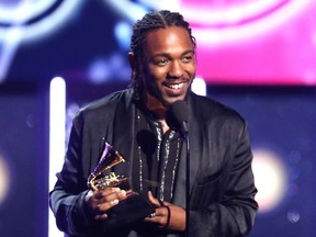 FILE - In this Jan. 28, 2018 file photo, rapper Kendrick Lamar accepts the award for best rap album for "Damn" at the 60th annual Grammy Awards in New York. On Monday, April 16, 2018, Lamar won the Pulitzer Prize for music for his album "Damn."