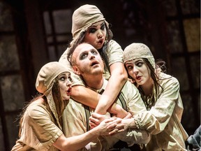 Caitlin Wood, Geoffrey  Sirett, Erica Iris Huang and  Magali Simard-Galdes perform in Overcoat at the Vancouver Playhouse, one of the anchor productions of the Vancouver Opera Festival.