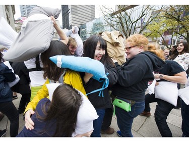 Fans of International Pillow Fight Day joined in a pillow fight at 3 p.m. at the Robson Street plaza near Vancouver Art Gallery on April 07 2018.