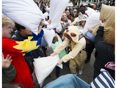Fans of International Pillow Fight Day joined in a pillow fight at 3 p.m. at the Robson Street plaza near Vancouver Art Gallery on April 07 2018.