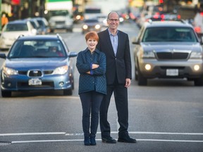 Joy MacPhail and Allan Seckel with traffic on West Broadway in Vancouver, B.C., January 15, 2018. The Mobility Pricing Commission will release its Phase 1 Project Update Report, which contains research on Metro Vancouver's traffic congestion issues and possible decongestion charging policy tools, key learnings from other jurisdictions around the world, and feedback from public and stakeholder engagement conducted in fall 2017.