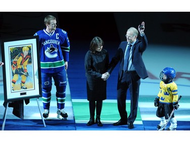 Jan. 24, 201: Former Vancouver Canucks star Thomas Gradin with wife and grandson are honoured before NHL game against  Dallas Stars at Rogers Arena.