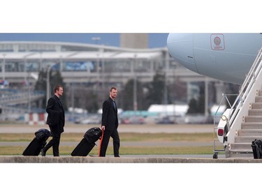 Jan. 28, 2010: Daniel and Henrik Sedin on the tarmac at the South Terminal of Vancouver International Airport in Richmond. The Canucks are on an extended road trip as GM Place is taken over for the Vancouver 2010 Winter Olympic Games.