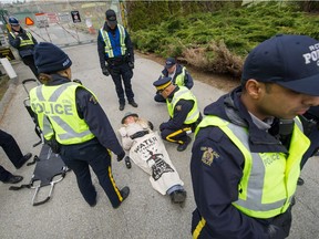Protesters being arrested at the gates of Kinder Morgan's facilities in Burnaby in March.
