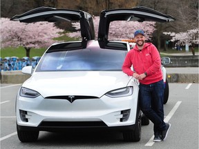 Zach Taylor and his Tesla Model X.