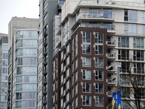 Analysts say prices of high-end condos have softened in downtown Vancouver despite sharp increases in prices for typical units across the Lower Mainland.