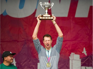 First placed Men's wheelchair winner is Tristan Smyth celebrates after Vancouver Sun Run in Vancouver, BC, April 22, 2018.