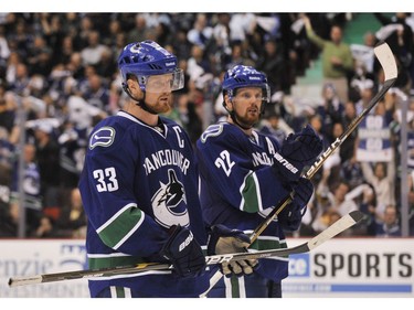 APRIL 26, 2011: Henrik Sedin,#33(L) and Daniel Sedin, #22(R) lineup for a face off in the second period of game seven's  victory over the Chicago Blackhawks in NHL playoff action at Rogers Arena.
