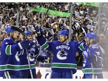 MAY 18, 2011 - Vancouver Canucks celebrate a goal by Daniel Sedin(R)  against San Jose Sharks in the third period of Game Two of the Western Conference Finals.
