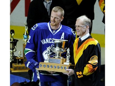 April 7,  2011: The Big Prize -The Vancouver Canucks Daniel Sedin 22,  gets his trophy from former Canucks Star Thomas Gradin.