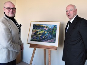 Darrin Martens (l), chief curator, and Michael Audain (r) of the Audain Art Museum in 2017 with the recently purchased Le Paysage, an Emily Carr painting that has been in a private collection for about 100 years. Photo: NICK PROCAYLO/PostMedia