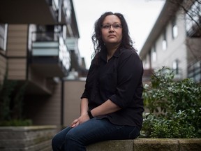 Tamara Parrales, who paid for an MRI at a private clinic, sits for a photograph at her home in Burnaby, B.C., on Saturday April 7, 2018. Excruciating pain had Tamara Parrales heading to the emergency department multiple times for nearly a year, and when a specialist brought up the possibility of ovarian cancer, she wasn't prepared to wait several months for an MRI in the public system.