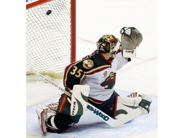 Feb. 12, 2006: Daneil Sedin scores on Minnesota Wild's goalie Manny Fernandez in overtime NHL  action at GM Place Stadium.