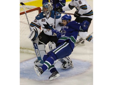 Oct 05 2007:  Henrik is tripped up in front of San Jose Sharks goalie Evgeni Nabokov in first period action.