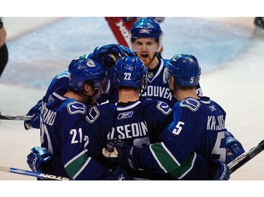 January 3, 2008: Vancouver Canucks  celebrate Daniel Sedin (22) goal  against  New York Rangers.