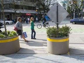The City of Vancouver uses planters on the VAG south plaza, to create a barrier separating people and vehicles.