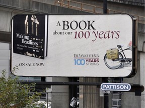 A Pattison Outdoor billboard advertises a Vancouver Sun 100-anniversary book back in 2012.