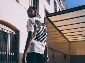 A model wears a look from Off-White by Virgil Abloh. The brand has opened a boutique in Vancouver.