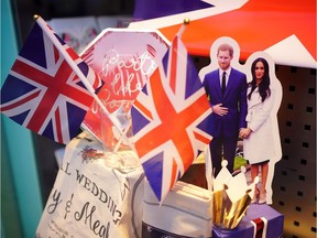 Souvenirs featuring Britain's Prince Harry and his fiance, US actress Meghan Markle are displayed in a gift shop on May 2, 2018 in Windsor, England.