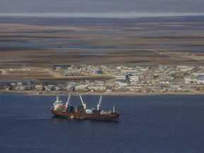 A cargo ship sits in the bay at Cambridge Bay, Nunavut, in September 2017.