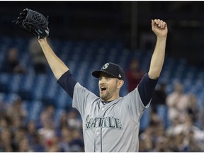 Seattle Mariners starting pitcher James Paxton, from Ladner, B.C., reacts after throwing a no hitter against the Toronto Blue Jays in American League MLB baseball action in Toronto on Tuesday May 8, 2018. Paxton is the first Canadian to have a no-hitter since Toronto's Dick Fowler did it for the Philadelphia Athletics in 1945.