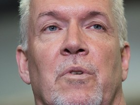 British Columbia Premier John Horgan speaks about the flooding situation in the province during a news conference in Chilliwack, B.C., on Wednesday May 16, 2018.