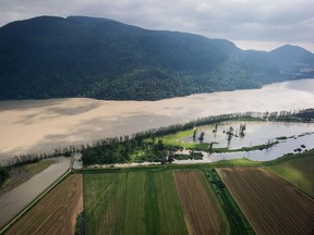 Flooded farmland is seen along the Fraser River in an aerial view near Abbotsford, B.C., on Wednesday May 16, 2018.