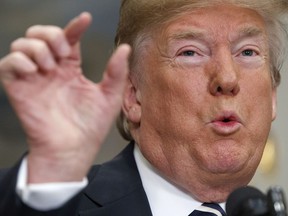 FILE - In this Thursday, May 24, 2018, file photo, President Donald Trump speaks about North Korea before signing the "Economic Growth, Regulatory Relief, and Consumer Protection Act," in the Roosevelt Room of the White House in Washington. President Donald Trump's decision to walk away from a plan to meet North Korean leader Kim Jong Un next month in Singapore caught a lot of people off guard, including, it appears, Kim Jong Un. Every indication is that Pyongyang still wants to make the meeting happen. And as soon as possible.