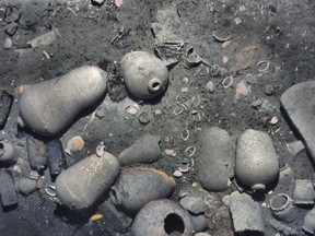 This November 2015 photo released Monday, May 21, 2018, by the Woods Hole Oceanographic Institution shows ceramic jars and other items from the 300-year-old shipwreck of the Spanish galleon San Jose on the floor of the Caribbean Sea off the coast of Colombia. New details about the discovery were released Monday with permission from the agencies involved in the search, including the Colombian government. Experts believe the ship's treasure is worth billions of dollars today. (Woods Hole Oceanographic Institution via AP)