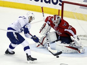 Tampa Bay Lightning centre Anthony Cirelli (71) has his shot stopped by Washington Capitals goaltender Braden Holtby (70) Monday, May 21, 2018, in Washington. (AP Photo/Alex Brandon) ORG XMIT: VZN111