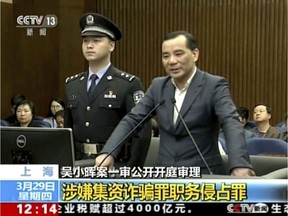 In this image taken from undated video footage run by China's CCTV via AP Video, Wu Xiaohui, the former chairman of the Anbang Insurance Group, speaks during a court session at the Shanghai No. 1 Intermediate People's Court in Shanghai.