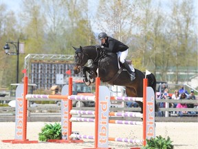 Vancouver's Chris Lowe and his equine partner Cunningham, seen here in action, will be part of the field of competitors at the Vancouver Grand Prix show jumping event on in downtown Vancouver on May 20, 2018.