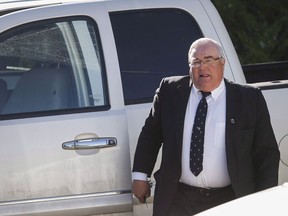 Winston Blackmore, who is accused of practising polygamy in a fundamentalist religious community, arrives to hear the verdict in his trial in Cranbrook, B.C. on Monday, July 24, 2017.