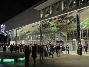 In this Jan. 9, 2018, photo, fans arrive at the ShoWare Center in Kent, Wash., about 20 miles south of Seattle, for a Western Hockey League game between the Seattle Thunderbirds and the Portland Winterhawks. Hockey's history in Seattle dates back more than a century to when the Seattle Metropolitans hoisted the 1917 Stanley Cup, and all indications are that an NHL franchise could arrive sometime after 2020, depending on construction of a remodeled Seattle Center arena.