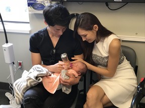 Masa Takano, baby Sakurako and Kana Takano at the new St. Paul's maternity clinic. The clinic provides care for pregnant women without a family doctor.