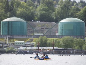 A small group of protesters are seen in their kayaks outside the Kinder Morgan marine facility in Burrard Inlet in Burnaby, B.C., Wednesday, May 9, 2018.