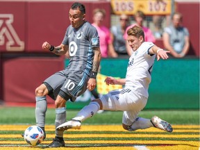 Minnesota’s Miguel Ibarra sneaks past Vancouver fullback Brett Levis to score the game’s lone goal Saturday morning at TCF Bank Stadium in Minneapolis.